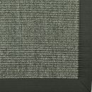 Graue Fußmatte mit strukturierter Oberfläche und schwarzem Rand, Nahaufnahme, rutschfest, Eingangsmatte.