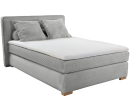 Modernes Boxspringbett in Hellgrau mit gestepptem Kopfteil, zwei Kissen und Topper, Schlafzimmermöbel.