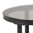Runder Gartentisch mit schwarzem Metallgestell und transparenter Glasplatte, modernes Outdoor-Möbel.
