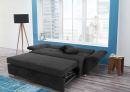 Schwarzes Schlafsofa im modernen Wohnzimmer mit Stadtblick, ausgeklappt, inklusive Kissen und Beistelltisch.