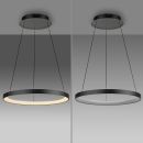 Moderne runde LED-Pendelleuchte in Schwarz, links mit warmweißem Licht, rechts ausgeschaltet, minimalistisch.