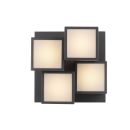 Moderne LED-Wandleuchte mit vier quadratischen, warm leuchtenden Elementen auf schwarzer Grundplatte.
