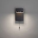 Moderne schwarze Wandleuchte mit Zugschalter, indirektem Licht und minimalistischem Design an grauer Wand.