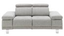Modernes, graues Sofa mit verstellbaren Kopfstützen und breiten Armlehnen auf Metallfüßen, Wohnzimmermöbel.