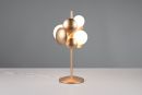 Moderne Tischlampe mit goldenen und weißen Kugeln auf grauem Hintergrund, stilvolle Designerleuchte.