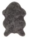 Dunkelgraues, flauschiges Schaffell-Teppich, rechteckig, als gemütliche Wohnaccessoire-Dekoration.