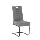 Moderner Freischwinger-Stuhl mit grauem Polster, Metallgestell und ergonomischer Rückenlehne für Esszimmer.