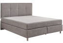 Modernes Boxspringbett in Grau mit hohem, gepolstertem Kopfteil und Metallfüßen, freigestellt auf weißem Hintergrund.