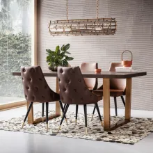 Elegantes Esszimmer mit KARE Stühlen "Urban Desire" in Braun. Die Stühle haben