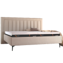 Modernes Boxspringbett mit beigem Polsterkopfteil, Matratze und Kissen, ideal für Schlafzimmer-Einrichtung.