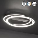 Moderne LED-Deckenleuchte in Schwarz mit zwei ovalen Lichtkreisen, energiesparend und stilvoll für Wohnräume.