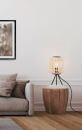 Moderne Wohnzimmer-Ecke mit grauem Sofa, Holztisch und dekorativer Stehlampe im skandinavischen Design.